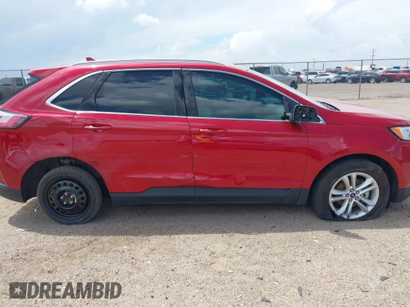 2020 Ford Edge SEL z VIN 2FMPK3J96LBA10912, wystawiony jako IAAI lot #42144667 z przebiegiem 88 722 mil mil oraz . Historia ofert i sprzedaży dostępna na DreamBid. Obrazek 14.
