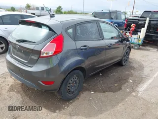 2016 Ford Fiesta SE z VIN 3FADP4EJ2GM183629, wystawiony jako IAAI lot #42193199 z przebiegiem 80 653 mil mil oraz . Historia ofert i sprzedaży dostępna na DreamBid. Obrazek 4.