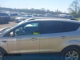 2017 Ford Escape SE with VIN 1FMCU0GD3HUC94245, listed as a IAAI auction lot 41877799 with 214,571 mi miles. Bid and sale history available at carsss.com. Image 14.