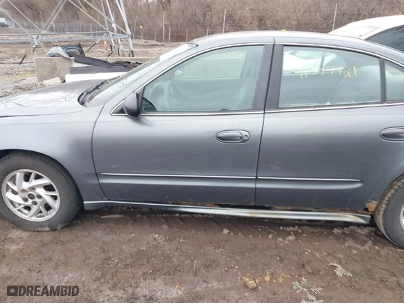 2004 Pontiac Grand Am SE with VIN 1G2NE52FX4M674634, listed as a IAAI auction lot 41547421 with 125,225 mi miles. Bid and sale history available at carsss.com. Image 14.