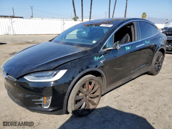 2019 Tesla Model X P100D with VIN 5YJXCBE46KF185298, listed as a Copart auction lot 74799084 with NaN miles and Salvage Title. Bid and sale history available at carsss.com. Image 1.