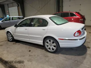 2004 Jaguar X-Type with VIN SAJEA51C34WE06046, listed as a Copart auction lot 56982105 with 69,265 mi miles and Clean Title. Bid and sale history available at DreamBid. Image 2.