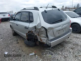 2006 Hyundai Tucson GL with VIN KM8JM12B56U480904, listed as a IAAI auction lot 41844087 with 216,322 mi miles. Bid and sale history available at carsss.com. Image 3.