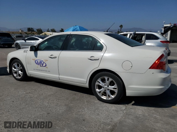2012 Ford Fusion SE z VIN 3FAHP0HA9CR122037, wystawiony jako Copart lot #58367255 z przebiegiem 136 266 mil mil oraz Czysty tytuł • Clean title. Historia ofert i sprzedaży dostępna na DreamBid. Obrazek 2.