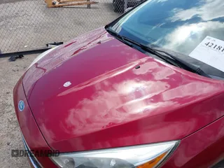 2017 Ford Focus SE z VIN 1FADP3F23HL313857, wystawiony jako IAAI lot #42181530 z przebiegiem 93 478 mil mil oraz . Historia ofert i sprzedaży dostępna na DreamBid. Obrazek 6.
