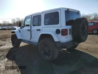 2021 Jeep Wrangler Unlimited Sahara with VIN 1C4JJXP64MW762819, listed as a Copart auction lot 49796845 with 76,543 mi miles and Salvage Title. Bid and sale history available at DreamBid. Image 2.