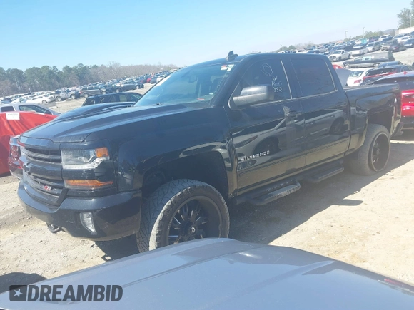 2017 Chevrolet Silverado 1500 LT with VIN 3GCUKREC1HG358752, listed as a IAAI auction lot 41775110 with 150,528 mi miles and . Bid and sale history available at DreamBid. Image 17.