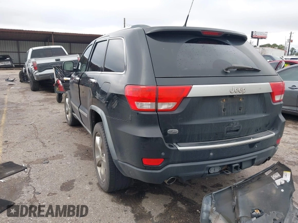 2011 Jeep Grand Cherokee Overland with VIN 1J4RS6GT7BC518123, listed as a IAAI auction lot 41277374 with 163,752 mi miles and . Bid and sale history available at DreamBid. Image 3.
