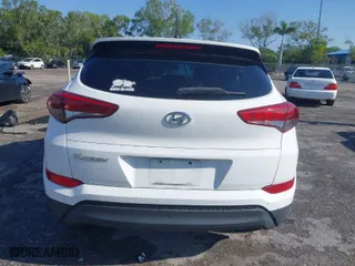 2018 Hyundai Tucson SE with VIN KM8J23A42JU627533, listed as a IAAI auction lot 41880112 with 61,840 mi miles. Bid and sale history available at carsss.com. Image 17.