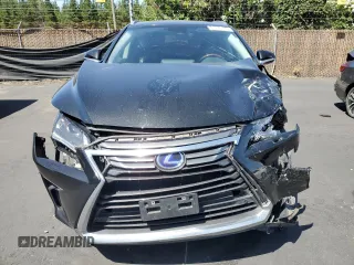 2018 Lexus RX 450hL Premium with VIN JTJDGKCAXJ2000538, listed as a Copart auction lot 61776195 with 74,988 mi miles and Salvage title. Bid and sale history available at DreamBid. Image 5.