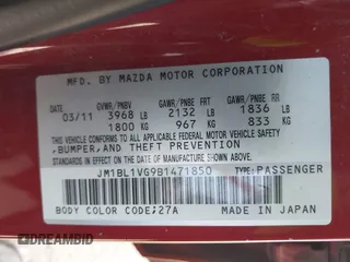2011 Mazda Mazda3 i Touring with VIN JM1BL1VG9B1471850, listed as a IAAI auction lot 42129977 with 160,011 mi miles. Bid and sale history available at carsss.com. Image 9.