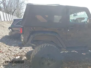 2015 Jeep Wrangler Sahara с VIN 1C4AJWBG7FL703858, выставлен на аукционе IAAI как лот 41720656 с пробегом 110 671 миль миль и . История ставок и продаж доступна на DreamBid. Изображение 21.