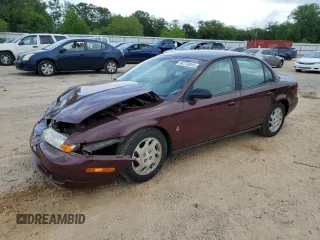 2001 Saturn SL z VIN 1G8ZK54761Z320887, wystawiony jako Copart lot #54170885 z przebiegiem 99 265 mil mil oraz Szkody całkowita. Historia ofert i sprzedaży dostępna na DreamBid. Obrazek 1.