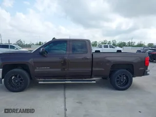 2016 Chevrolet Silverado 1500 LT with VIN 1GCRCREC8GZ180162, listed as a IAAI auction lot 41946432 with 162,090 mi miles. Bid and sale history available at carsss.com. Image 14.