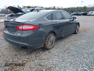 2016 Ford Fusion Titanium with VIN 3FA6P0K94GR183257, listed as a IAAI auction lot 41374728 with 67,780 mi miles and . Bid and sale history available at carsss.com. Image 4.