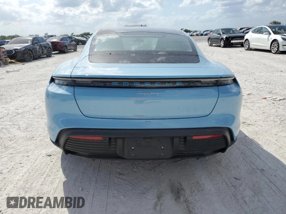 2024 Porsche Taycan z VIN WP0AA2Y17RSA10720, wystawiony jako Copart lot #50988475 z przebiegiem 2 836 mil mil oraz Szkoda całkowita • Salvage title. Historia ofert i sprzedaży dostępna na DreamBid. Obrazek 6.