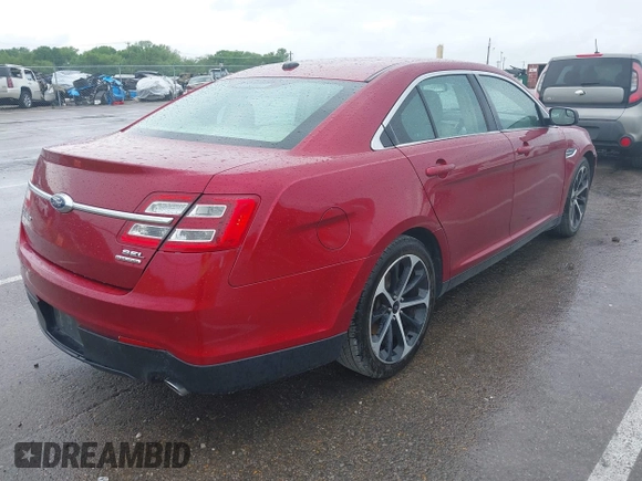 2014 Ford Taurus SEL z VIN 1FAHP2E83EG125622, wystawiony jako IAAI lot #42204238 z przebiegiem 134 032 mil mil oraz . Historia ofert i sprzedaży dostępna na DreamBid. Obrazek 4.