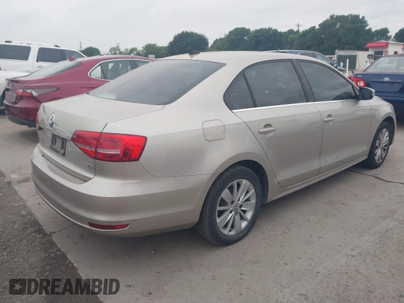 2015 Volkswagen Jetta Sedan 1.8T SE w/Connectivity with VIN 3VWD07AJ0FM231873, listed as a IAAI auction lot 42142327 with 156,230 mi miles. Bid and sale history available at carsss.com. Image 4.