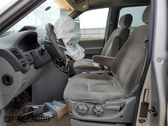 2004 Kia Sedona LX with VIN KNDUP131246544574, listed as a Copart auction lot 87650855 with 85,972 mi miles and Salvage Title. Bid and sale history available at carsss.com. Image 7.