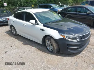 2018 Kia Optima LX z VIN 5XXGT4L36JG210914, wystawiony jako IAAI lot #42545614 z przebiegiem 126 286 mil mil oraz . Historia ofert i sprzedaży dostępna na DreamBid. Obrazek 1.