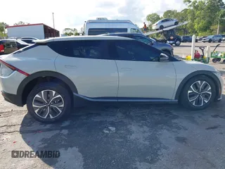 2024 Kia EV6 Wind with VIN KNDC34LA8R5218266, listed as a IAAI auction lot 41626790 with 9,682 mi miles. Bid and sale history available at carsss.com. Image 13.