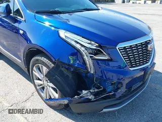 2023 Cadillac XT5 FWD Premium Luxury z VIN 1GYKNCRS3PZ176654, wystawiony jako IAAI lot #42136259 z przebiegiem 20 403 mil mil oraz . Historia ofert i sprzedaży dostępna na DreamBid. Obrazek 6.