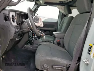 2024 Jeep Wrangler Sahara with VIN 1C4PJXEN6RW110988, listed as a Copart auction lot 46257325 with 39,889 mi miles and Clean title. Bid and sale history available at DreamBid. Image 7.