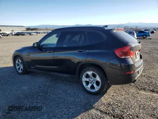 2015 BMW X1 sDrive28i with VIN WBAVM1C52FV315768, listed as a Copart auction lot 44970185 with 117,045 mi miles and Salvage Title. Bid and sale history available at carsss.com. Image 2.
