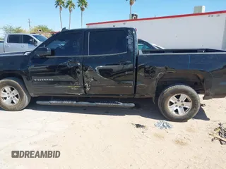2018 Chevrolet Silverado 1500 LT with VIN 3GCPCREC9JG569925, listed as a IAAI auction lot 42086625 with 184,594 mi miles and . Bid and sale history available at DreamBid. Image 14.