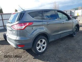 2013 Ford Escape SE with VIN 1FMCU9GX8DUC76686, listed as a IAAI auction lot 41809554 with 126,718 mi miles. Bid and sale history available at carsss.com. Image 4.