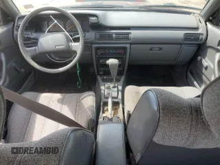 1991 Toyota Camry z VIN 4T1SV24E2MU387012, wystawiony jako Copart lot #57576164 z przebiegiem 117 436 mil mil oraz Nie do naprawy • Non repairable. Historia ofert i sprzedaży dostępna na DreamBid. Obrazek 8.