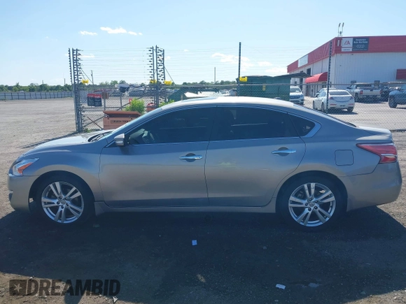 2013 Nissan Altima SL z VIN 1N4BL3AP3DC288653, wystawiony jako IAAI lot #42304043 z przebiegiem 108 640 mil mil oraz . Historia ofert i sprzedaży dostępna na DreamBid. Obrazek 14.