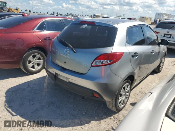 2014 Mazda 2 Sport with VIN JM1DE1KY6E0189739, listed as a Copart auction lot 76468914 with 107,164 mi miles and Salvage Title. Bid and sale history available at carsss.com. Image 3.