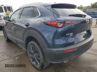 2023 Mazda CX-30 Premium Plus with VIN 3MVDMBEY9PM500907, listed as a Copart auction lot 70871494 with 38,599 mi miles and Salvage title. Bid and sale history available at DreamBid. Image 2.