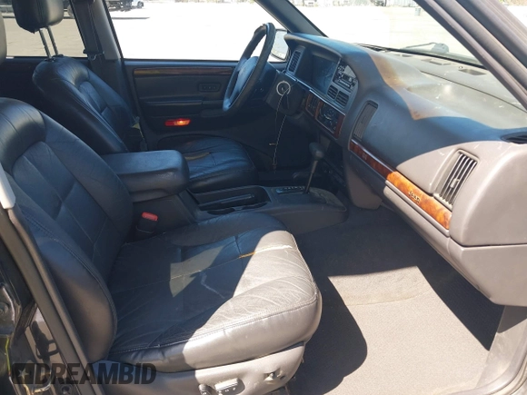 1997 Jeep Grand Cherokee Limited z VIN 1J4GZ78Y3VC683674, wystawiony jako IAAI lot #42331984 z przebiegiem 227 226 mil mil oraz . Historia ofert i sprzedaży dostępna na DreamBid. Obrazek 5.