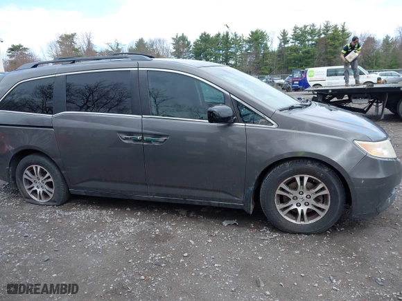 2012 Honda Odyssey EX with VIN 5FNRL5H42CB086159, listed as a IAAI auction lot 42096834 with 208,701 mi miles. Bid and sale history available at carsss.com. Image 13.