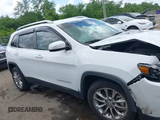 2021 Jeep Cherokee Latitude Lux with VIN 1C4PJLMXXMD239400, listed as a IAAI auction lot 42156023 with 80,304 mi miles and . Bid and sale history available at DreamBid. Image 13.