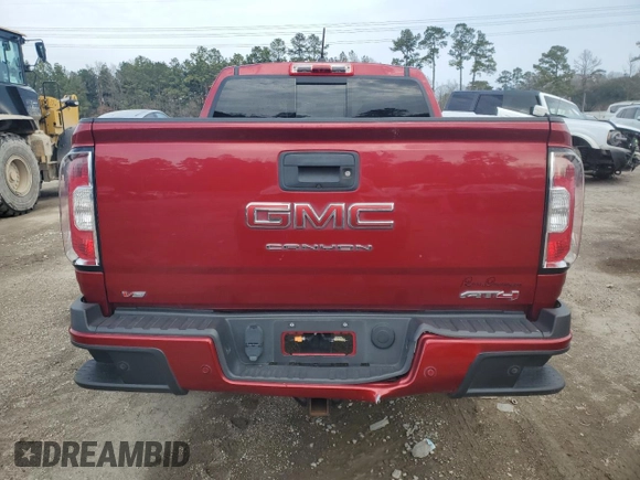 2021 GMC Canyon 4WD AT4 w/Leather with VIN 1GTG6FEN2M1224875, listed as a Copart auction lot 45553885 with 81,495 mi miles and Salvage Title. Bid and sale history available at carsss.com. Image 6.