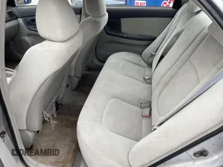 2004 Kia Spectra LX with VIN KNAFE121845043143, listed as a IAAI auction lot 41574523 with 211,758 mi miles. Bid and sale history available at carsss.com. Image 8.