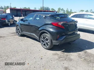 2021 Toyota C-HR LE with VIN NMTKHMBX7MR126165, listed as a IAAI auction lot 41848045 with 26,882 mi miles. Bid and sale history available at carsss.com. Image 3.