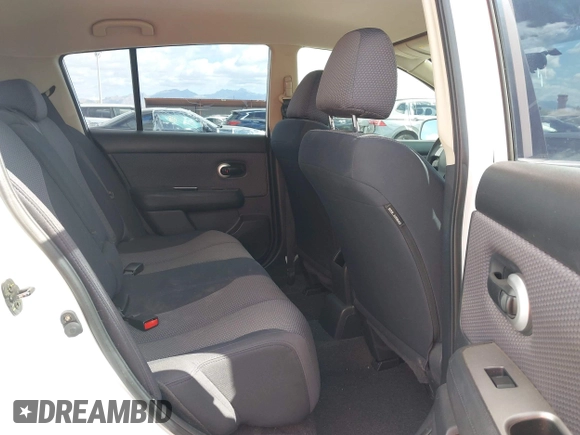 2009 Nissan Versa 1.8 S with VIN 3N1BC13E19L371006, listed as a IAAI auction lot 42064633 with 67,424 mi miles. Bid and sale history available at carsss.com. Image 8.