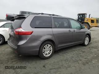 2015 Toyota Sienna XLE with VIN 5TDYK3DC6FS660035, listed as a Copart auction lot 51660075 with 176,968 mi miles and Salvage Title. Bid and sale history available at DreamBid. Image 3.