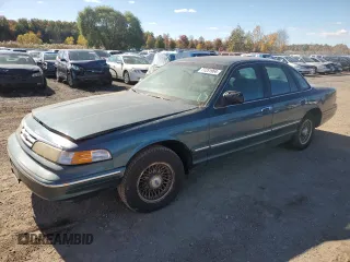 1996 Ford Crown Victoria LX с VIN 2FALP74W5TX146843, выставлен на аукционе Copart как лот 77251964 с пробегом 74 559 миль миль и Чистый • Clean title. История ставок и продаж доступна на DreamBid. Изображение 1.