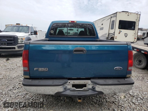 2001 Ford F-350 XL z VIN 1FTSW30F61EA47096, wystawiony jako Copart lot #56826595 z przebiegiem 205 679 mil mil oraz Szkoda całkowita • Salvage title. Historia ofert i sprzedaży dostępna na DreamBid. Obrazek 6.