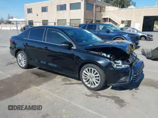 2015 Volkswagen Jetta Sedan 1.8T SE w/Connectivity with VIN 3VWD07AJ6FM354397, listed as a IAAI auction lot 41772983 with 100,265 mi miles. Bid and sale history available at carsss.com. Image 1.
