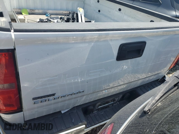 2021 Chevrolet Colorado 2WD Work Truck with VIN 1GCHSBEA4M1120510, listed as a Copart auction lot 49787535 with 120,432 mi miles and Salvage title. Bid and sale history available at DreamBid. Image 6.