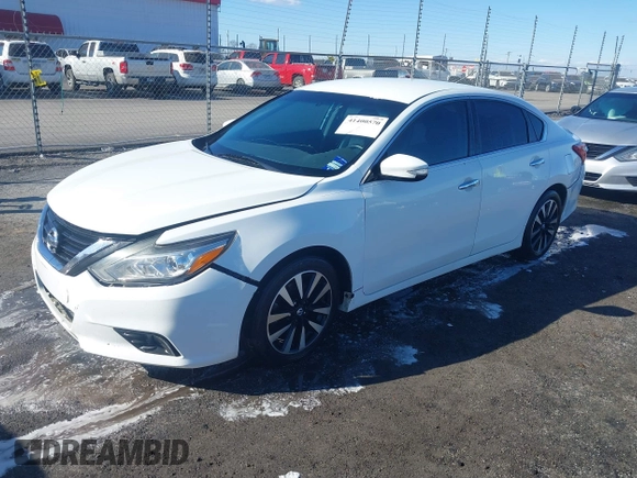 2018 Nissan Altima S with VIN 1N4AL3AP9JC181033, listed as a IAAI auction lot 41400570 with 198,928 mi miles and . Bid and sale history available at carsss.com. Image 22.