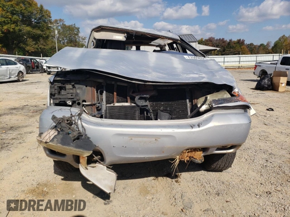 2000 GMC Denali z VIN 1GKEK13R2YR138523, wystawiony jako Copart lot #77609804 z przebiegiem 203 514 mil mil oraz Szkody całkowita. Historia ofert i sprzedaży dostępna na DreamBid. Obrazek 5.
