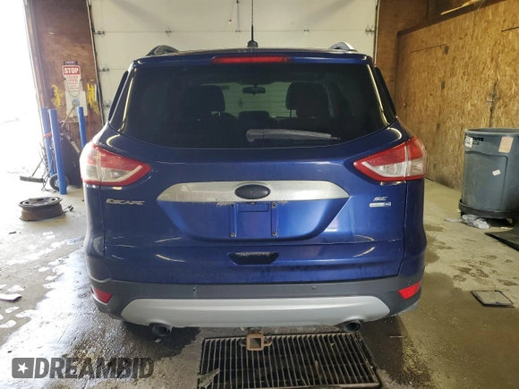 2014 Ford Escape SE with VIN 1FMCU9G90EUD21655, listed as a Copart auction lot 55458095 with 167,900 mi miles and Salvage Title. Bid and sale history available at DreamBid. Image 6.