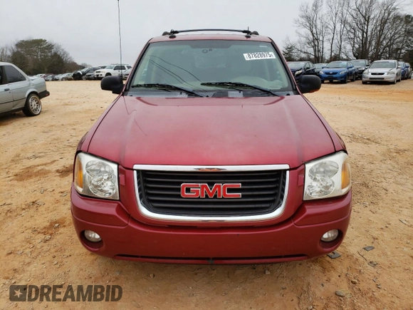 2004 GMC Envoy SLT with VIN 1GKDT13S342262833, listed as a Copart auction lot 87828975 with 203,404 mi miles and Salvage Title. Bid and sale history available at carsss.com. Image 5.